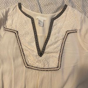 Cream with black trim shirt